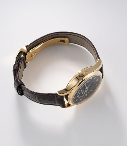 Retrograde Perpetual Calendar in Yellow Gold with Black Dial