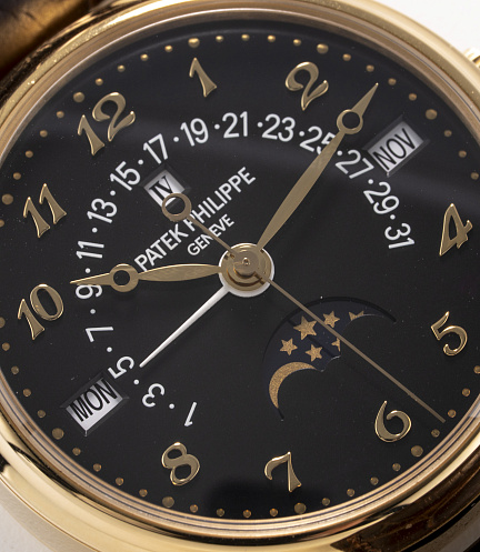 Retrograde Perpetual Calendar in Yellow Gold with Black Dial