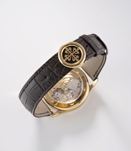 Retrograde Perpetual Calendar in Yellow Gold with Black Dial