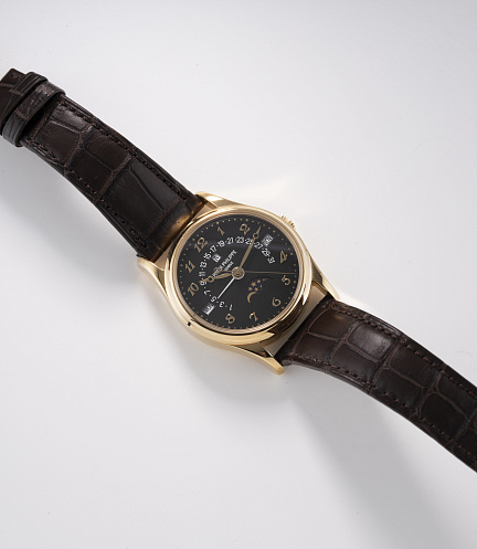 Retrograde Perpetual Calendar in Yellow Gold with Black Dial