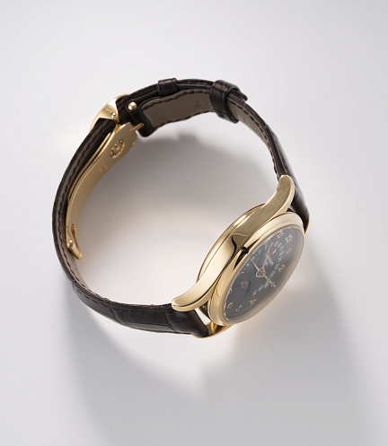 Retrograde Perpetual Calendar in Yellow Gold with Black Dial