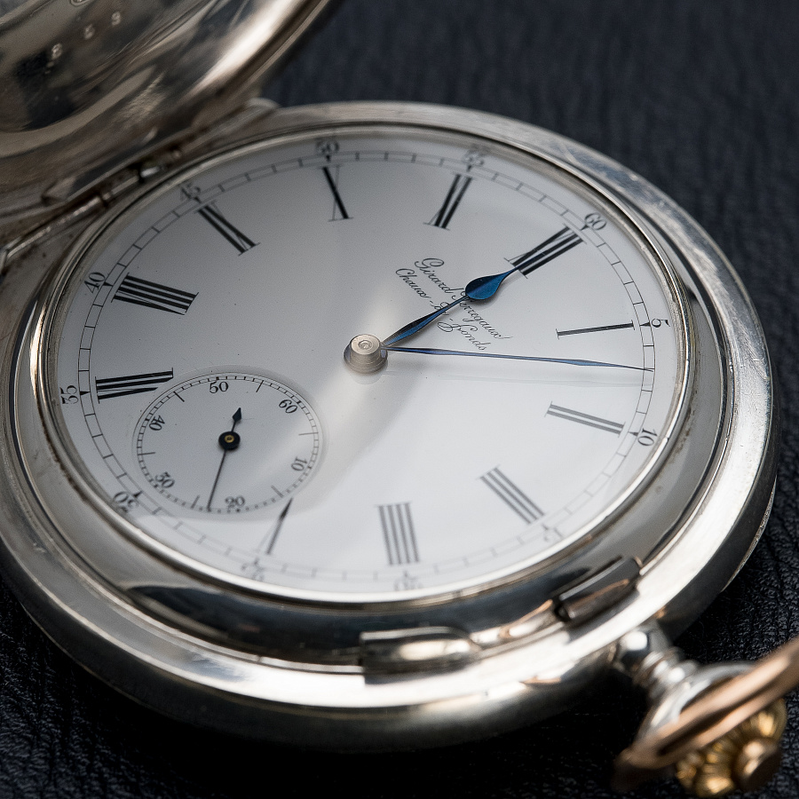 Silver Pocket Watch with a Triple Bridge Movement