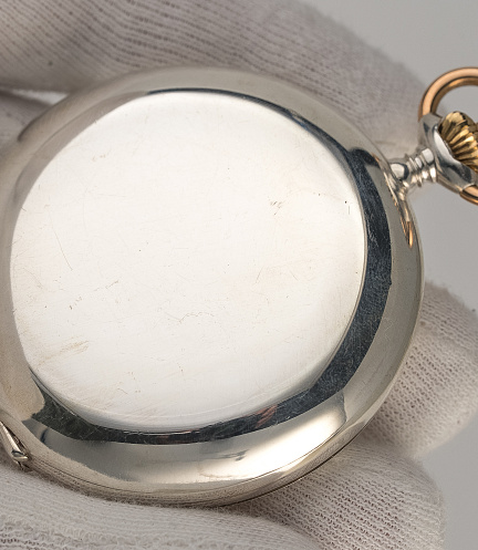 Silver Pocket Watch with a Triple Bridge Movement