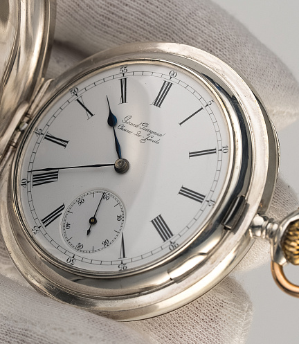 Silver Pocket Watch with a Triple Bridge Movement