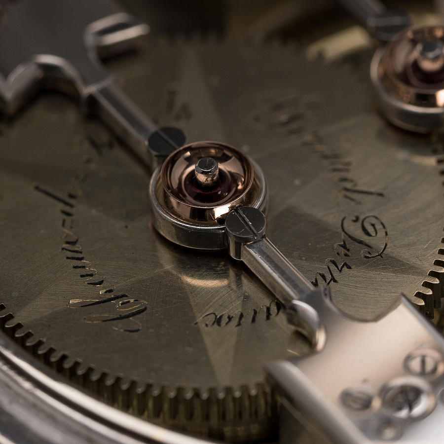 Silver Pocket Watch with a Triple Bridge Movement