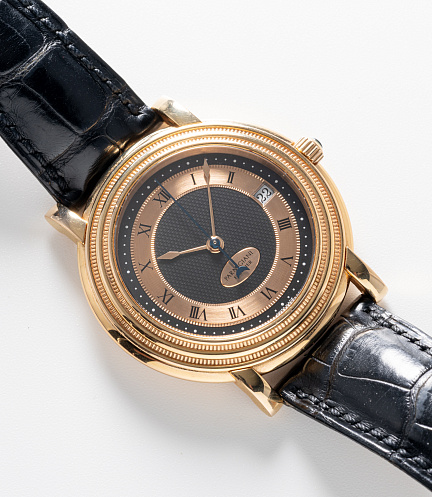 Toric in Rose Gold with Black Dial