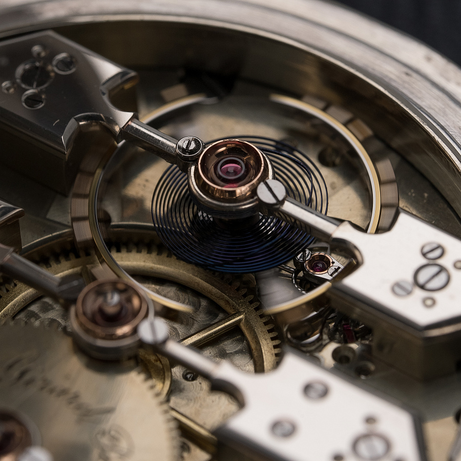 Silver Pocket Watch with a Triple Bridge Movement