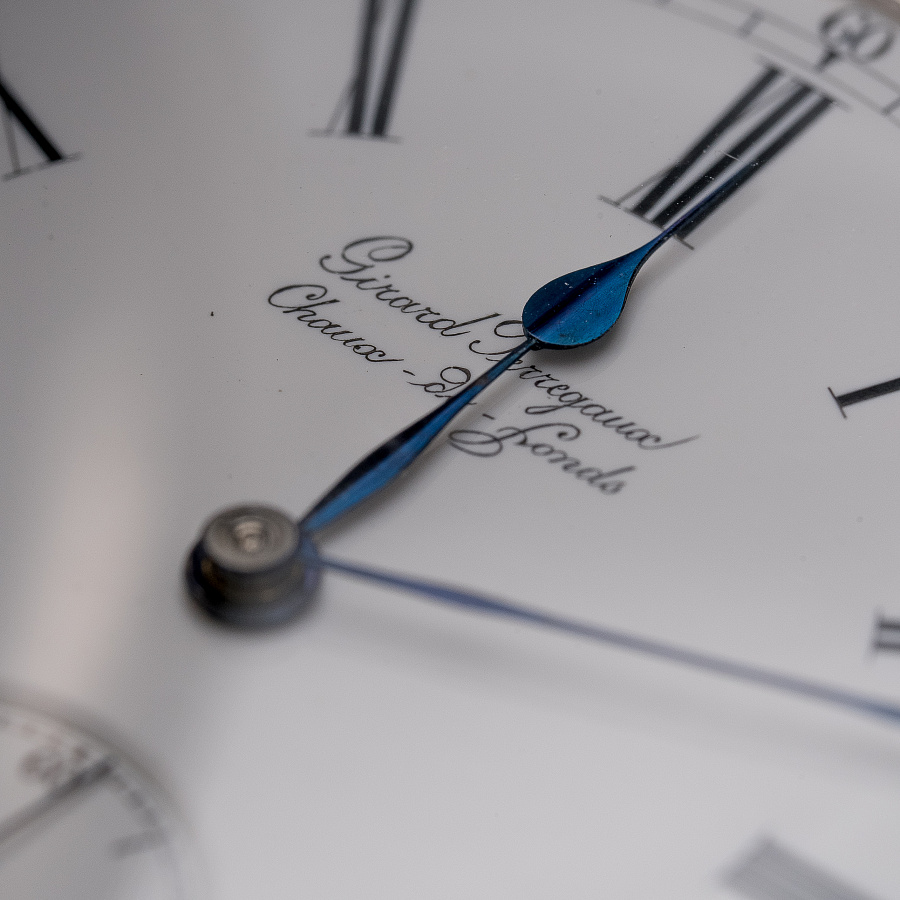 Silver Pocket Watch with a Triple Bridge Movement